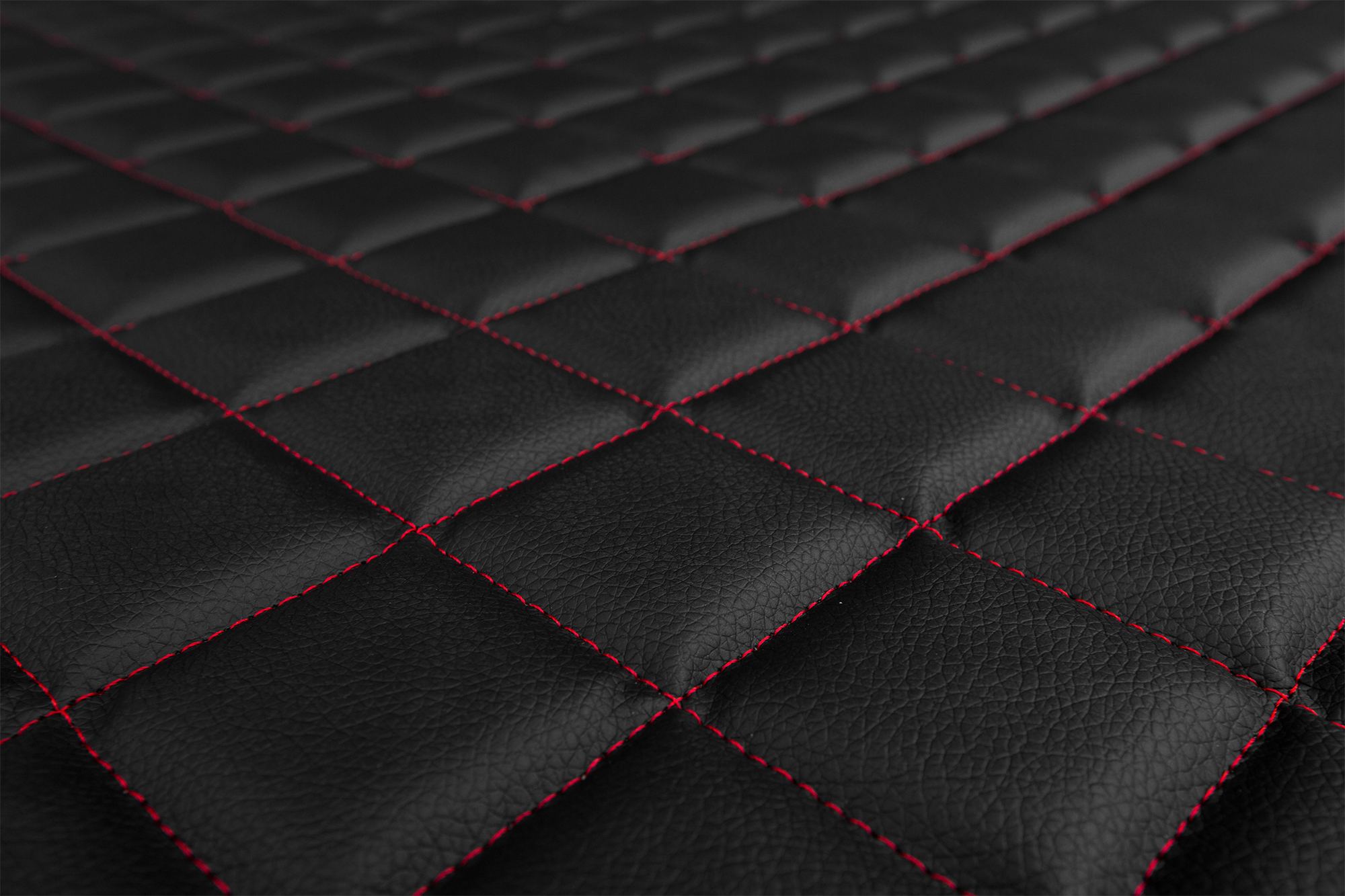 Detail povrchu a prošívání potahů ELEGANCE Q: Černo-červená